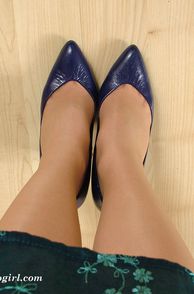 Looking Down At Her Blue Heeled Feet