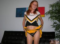 Redheaded Teen Teasing In Her Cheer Uniform - dainty clothed young woman